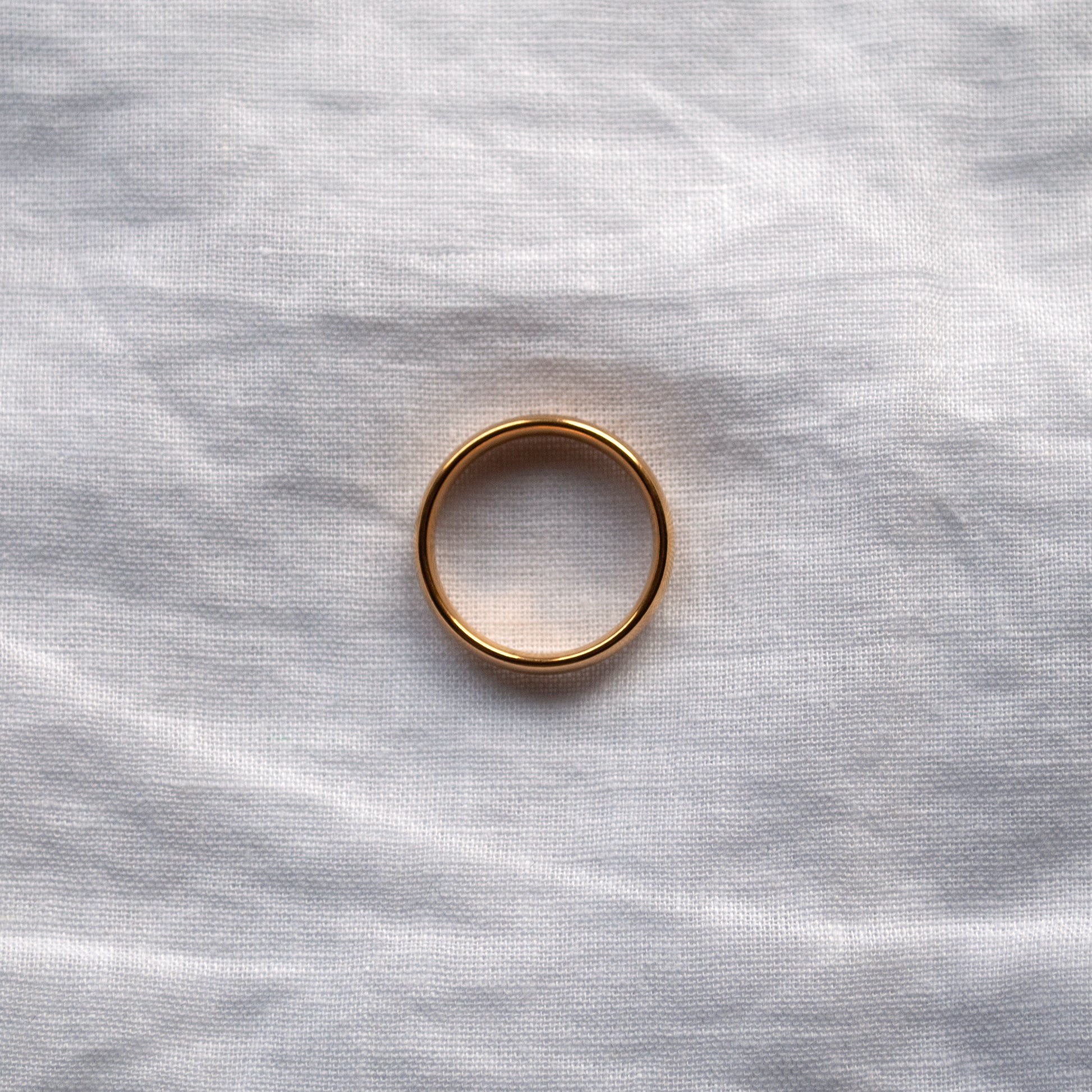 Domed, classic, tarnish-free gold ring